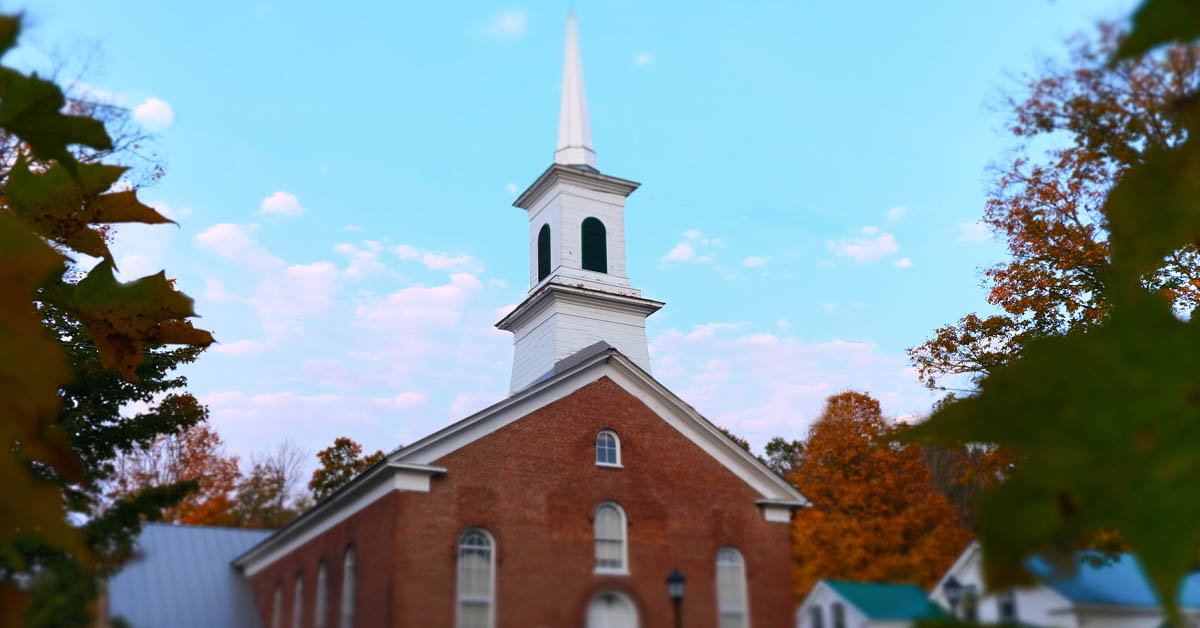 The exterior of the church in autumn