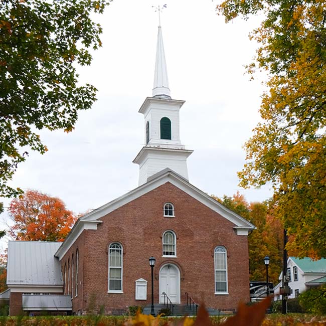 The exterior of the church in autumn