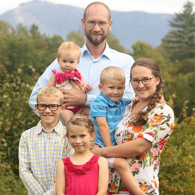 Dom with his wife and four children